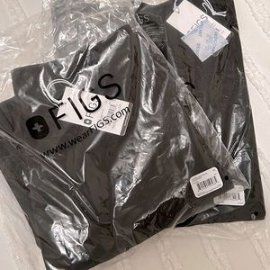 Brand new in bag with tags. Figs scrubs. Black. Petite straight cut pants + top